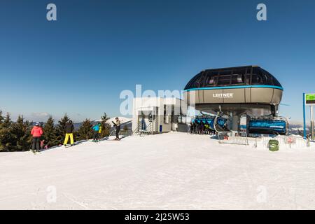 SPINDLERUV MLYN, CZECH REPUBLIC - 10 th March 2022: Plane, the top station of the cable car. Hromovka in mountain Krkonose, the most popular Czech ski Stock Photo