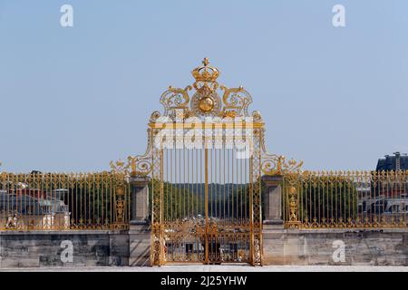 Main golden door in exterior facade of Versailles Palace,. Stock Photo