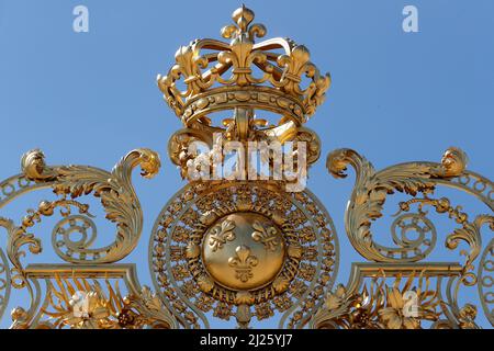 Main golden door in exterior facade of Versailles Palace,. Stock Photo