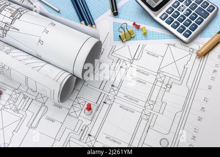 Technical drawing with millimeter paper and drawing tools. Mathematics and engineering Stock Photo