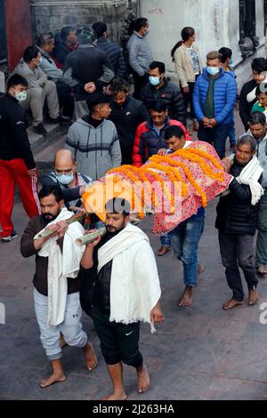 Hindu cremation process in progress at a temple in Pashupatinath. Stock Photo