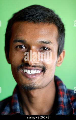 Young smiling nepalese man. Stock Photo