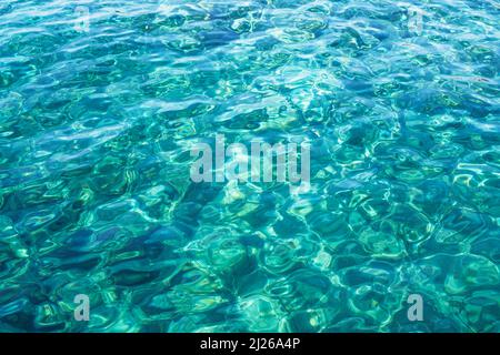 Transparent turquoise sea water, natural marine background. Stock Photo