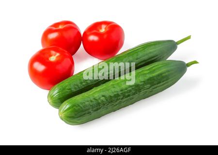 Ripe tomatoes and cucumbers isolated on white Stock Photo