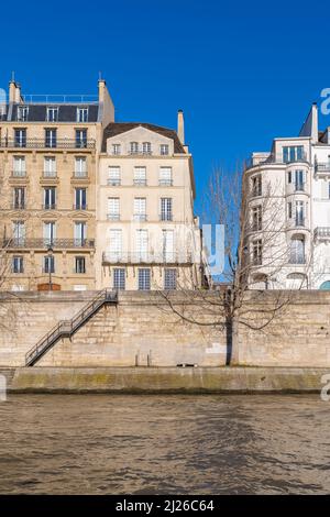 Paris, beautiful facades quai d Orleans, on the ile Saint-Louis, sunny day in winter Stock Photo