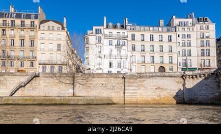 Paris, beautiful facades quai d Orleans, on the ile Saint-Louis, sunny day in winter Stock Photo