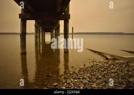 sahara dust over Ammersee in Bavaria in spring 2022 Stock Photo