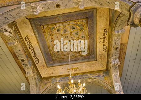 The hebrew text and wood ceiling covering over the central bima. At the Etz Hayim synagogue, now an art exhibition space,  in Izmir, Turkey. Stock Photo