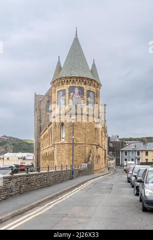 A portrait orientation view of the Aberystwyth Old College south tower with mosaics representing Archimedes receiving the emblems of modern science an Stock Photo