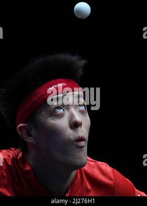 Doha, Qatar. 29th Mar, 2022. Qiu Dang of Germany serves during the men's singles round of 16 match against Hugo Calderano of Brazil at the WTT Star Contender Doha 2022 in Doha, Qatar, March 29, 2022. Credit: Nikku/Xinhua/Alamy Live News Stock Photo