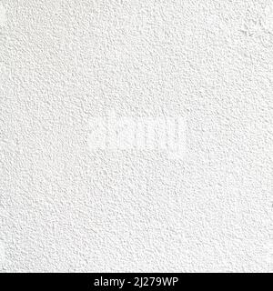 Blank white plastered wall background, rough texture of concrete,  abstract backgrounds. Background for design wallpaper or cards. Stock Photo