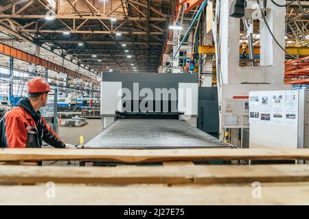Industrial automated machine for working with metal in a factory. Stock Photo
