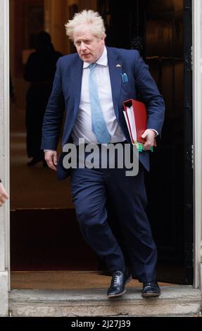 London, UK. 30th Mar, 2022. Prime Minister, Boris Johnson, leaves number 10 Downing Street to go to the Houses of Parliamnet for Prime Ministers Questions. He will face Sir Keir Starmer across the despatch box. Credit: Mark Thomas/Alamy Live News Stock Photo