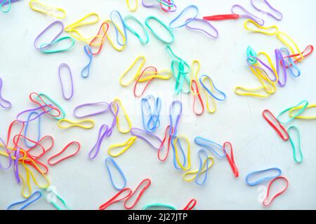 rainbow color Rubber bands on color background  Stock Photo