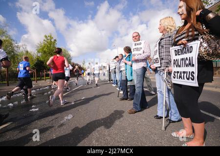 03/05/2010, Belfast, Northern Ireland.  Republicans hold a 'White Line Protest' in the middle of the Falls Road during the annual Belfast Marathon, calling for the end of prison brutality at HMP Maghaberry. Stock Photo