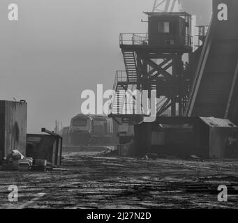 Withdrawn high speed train power car 43053 in the mist at Sims Metals, Newport docks, south Wales waiting to be cut up for scrap Stock Photo