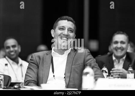 Johannesburg, South Africa - August 20, 2015: Delegates attending a sales convention in large conference hall Stock Photo