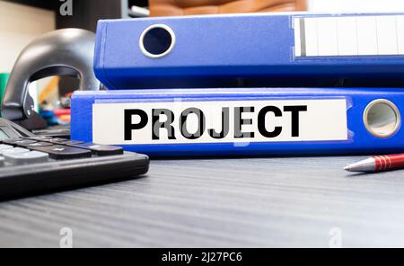 Projects words on labels with document binders Stock Photo