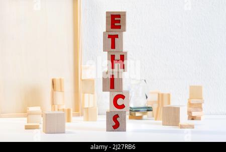 ETHICS word written on wood block, concept Stock Photo