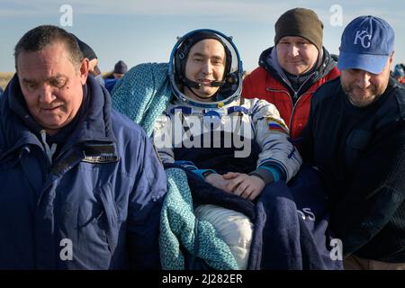 Zhezkazgan, Kazakhstan. 30th Mar, 2022. Expedition 66 Russian cosmonaut Pyotr Dubrov is carried to a medical tent shortly after he and fellow crew mates Mark Vande Hei of NASA and Anton Shkaplerov of Roscosmos landed in their Soyuz MS-19 spacecraft near the town of Zhezkazgan, Kazakhstan, on Wednesday, March 30, 2022. Vande Hei and Dubrov are returning to Earth after logging 355 days in space as members of Expeditions 64-66 aboard the International Space Station. Credit: UPI/Alamy Live News Stock Photo