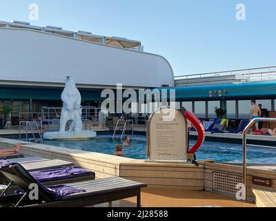 Ft. Lauderdale, FL USA - November 4, 2019: The Holland American Cruise Line Zuiderdam cruise ship indoor pool and hot tub with ornamental polar bears. Stock Photo