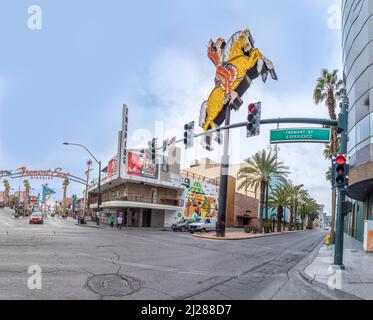 Las Vegas, USA - March 10, 2019: Fremont East district with neon sculptures, casinos and parking in early morning light in old part of Las Vegas, USA. Stock Photo
