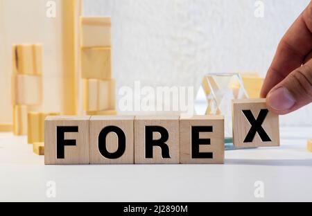 FOREX word written on wood block, business concept Stock Photo