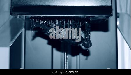 Stereolithography DPL 3d printer create detail, platform move close-up Stock Photo
