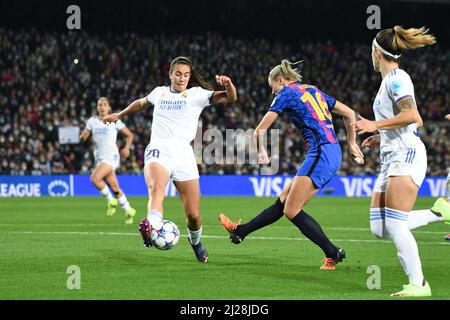 Barcelona, Spain. 30th Mar, 2022. BARCELONA, SPAIN - MARCH 30: Fridolina Rolfö of Barcelona fights for the ball with Rocío Gálvez of Real Madrid during a UEFA Women's Champions League match between Barcelona v Real Madrid at Camp Nou on March 30, 2022, in Barcelona, Spain. (Photo by Sara Aribó/PxImages) Credit: Px Images/Alamy Live News Stock Photo