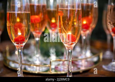 Non-alcoholic drinks served with a cherry inside the clear class Stock Photo