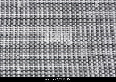 Grey patterns background from canvas of a chair. Stock Photo