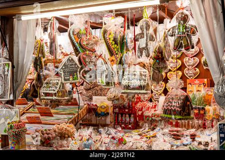 Krakow, Poland, lots of sweets on sale, traditional festival market stall, decorative gingerbread, various types of candy sold, group of objects Stock Photo