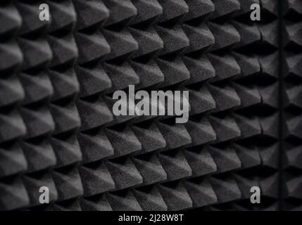 Sound insulation, audio isolation acoustic foam panel, wall tiles, recording studio room soundproofing equipment accessories, object detail, closeup Stock Photo