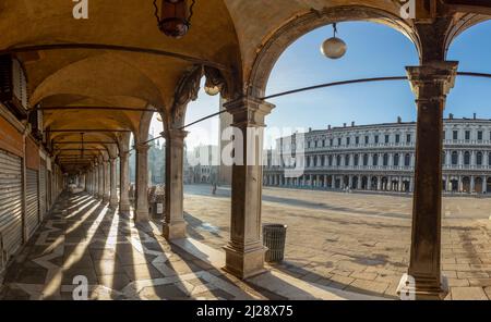 Venice, Italy - July 5, 2021: shadow at the colonnades at St. Mark's square in Venice, Italy. Stock Photo