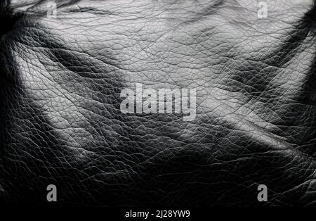 A Shiny Black Leather Background Stock Photo