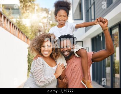 A happy family is but an earlier heaven. Shot of a family spending time together outside. Stock Photo