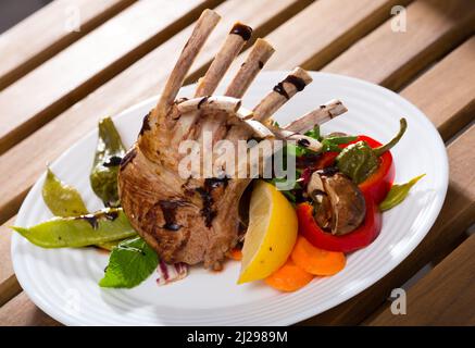 Roasted rectangle lamb rack Stock Photo