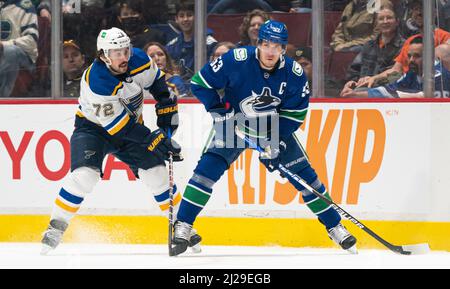 March 30, 2022, Vancouver, BC, CANADA: Vancouver Canucks' Elias Pettersson  (40) celebrates with teammate Quinn Hughes (43) after scoring a goal  against the St. Louis Blues during second period NHL hockey action