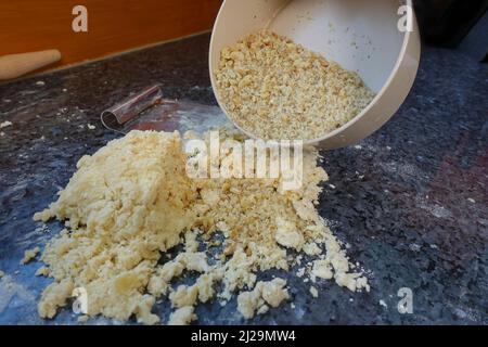 Southern German cuisine, baking, preparing the walnut dough for the hearty vegetable cake with walnut base, Germany Stock Photo