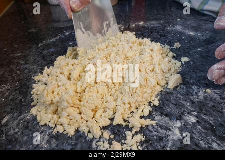 Southern German cuisine, baking, preparing the walnut dough for the hearty vegetable cake with walnut base, Germany Stock Photo