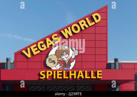 Vegas World arcade, logo with drawn cowboy, casino, Neuss, North Rhine-Westphalia, Germany Stock Photo