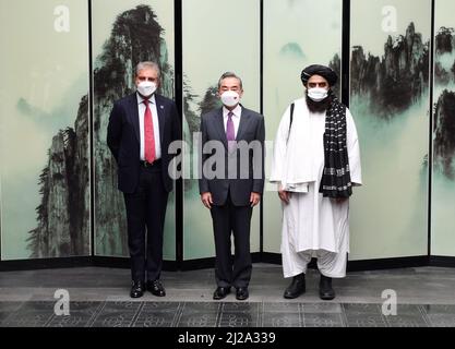 Hefei, China's Anhui Province. 30th Mar, 2022. Chinese State Councilor and Foreign Minister Wang Yi presides over the meeting of foreign ministers of China, Afghanistan and Pakistan in Tunxi, east China's Anhui Province, March 30, 2022. Pakistani Foreign Minister Shah Mahmood Qureshi and acting Foreign Minister of the Afghan Interim Government Amir Khan Muttaqi attended the meeting. Credit: Zhou Mu/Xinhua/Alamy Live News Stock Photo