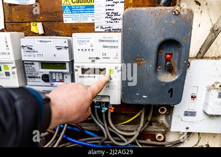 Pic shows: electricity meters in a block of flats in North London today  Many worried customers were checking their readings and submitting them befor Stock Photo