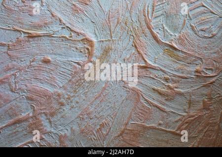 Stucco wall with gold paint Stock Photo