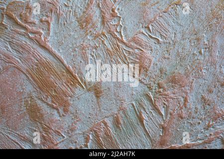 Stucco wall with gold paint Stock Photo