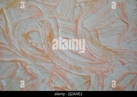 Stucco wall with gold paint Stock Photo