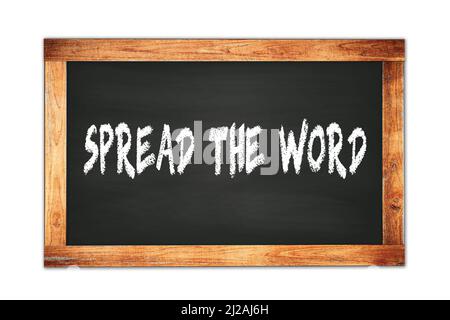 SPREAD  THE  WORD text written on black wooden frame school blackboard. Stock Photo