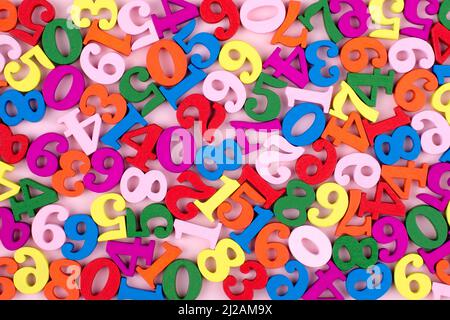 Colorful Wooden Numbers Background. Back to school concept. Stock Photo