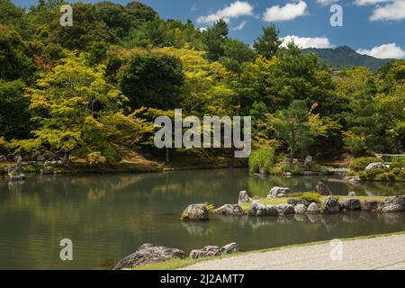 Horizontal view of the Japanese zen garden of the Tenryu-Ji Buddhist Temple, Arashiyama District, Kyoto, Japan Stock Photo