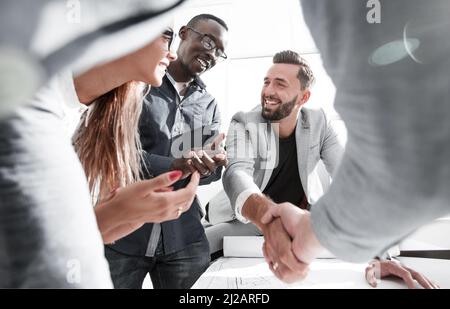 close up.architect and customer shaking hands Stock Photo